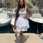 A Short White Tiered Dress With Thin Straps (31720)