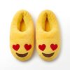 Plush emoji slippers