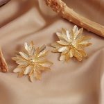 Multi-layered floral statement studs