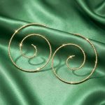 Spiral statement earrings